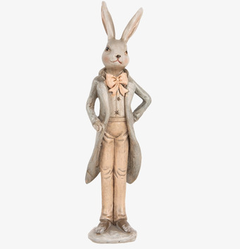 Bild av elegant kaninfigur i stilfull frack och rosett