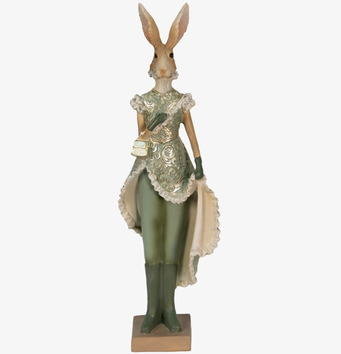 Bild av dekorativ kaninfigur i grön klänning