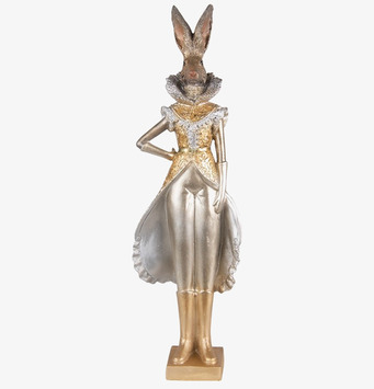 Bild av dekorativ kaninfigur i guld med eleganta detaljer