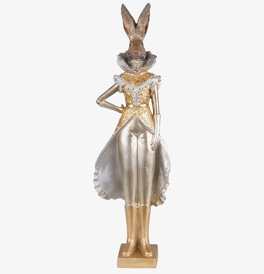 Bild av dekorativ kaninfigur i guld med eleganta detaljer