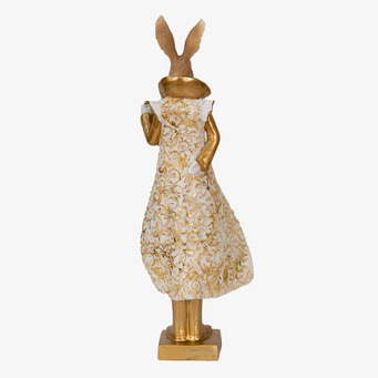 Bild av elegant gyllene kaninskulptur i intrikat design