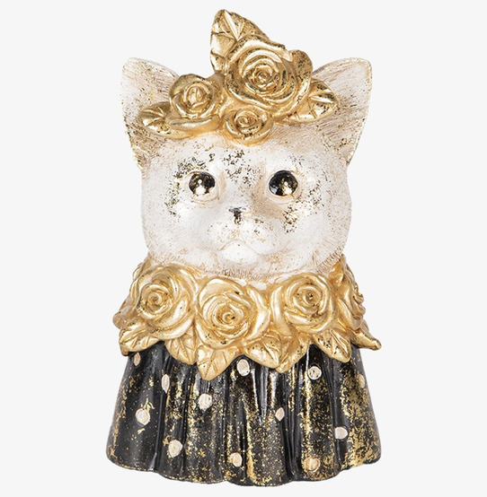 Bild av kattstaty i svart och guld med rosdetaljer