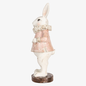 Bild av charmig dekorativ kanin i vit och rosa dräkt