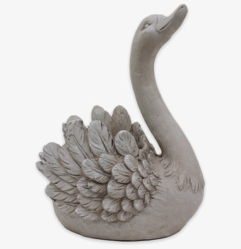 Bild av intrikat skulpterad svanformad keramikkruka