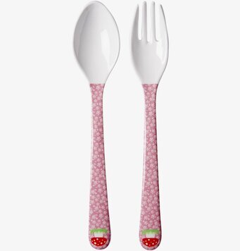 Bild av lekfullt bestickset med blommönster och svampmotiv