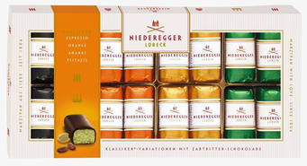 Bild av elegant förpackning med färgglad marsipan