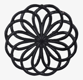 Bild av stilrent och funktionellt grytunderlägg i järn