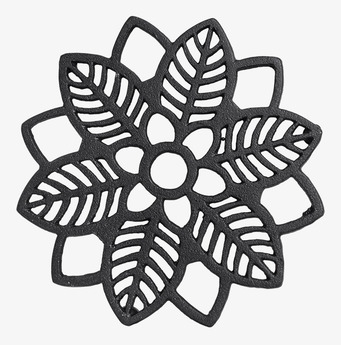 Bild av stilrent och robust grytunderlägg i järn