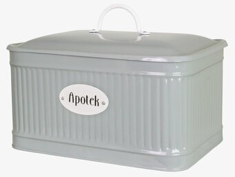 Bild av grön plåtburk med klassisk och stilfull design