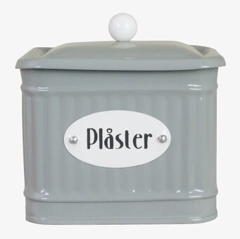 Bild av grågrön plåtburk för plåster med vit knopp