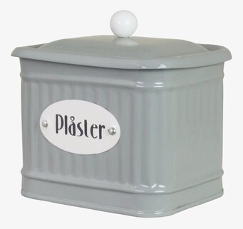 Bild av grön plåtburk för plåster med dekorativ stil