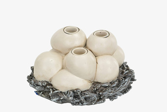 Bild av unik ljusstake med äggform och antik finish