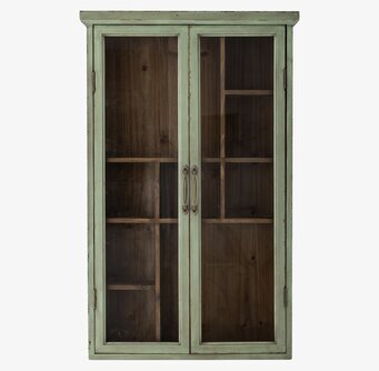 Bild av grönt väggskåp med glasdörrar och metallhandtag