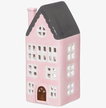 Bild av rosa ljuslykta formad som ett charmigt hus