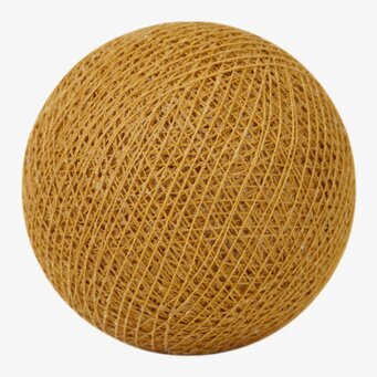 Bild av senapsgul dekorationsboll med moleskinstruktur