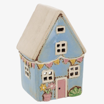 Bild av charmig ljuslykta som liknar ett miniatyrhus