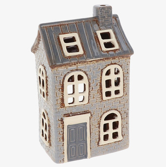 Bild av dekorativ ljuslykta utformad som ett litet hus