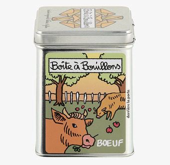 Bild av färgglad plåtburk med lantlig illustration