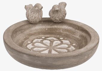 Bild av ett stilrent fågelbad med dekorativa detaljer