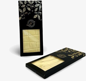 Bild: Elegant vit choklad i sofistikerad förpackning