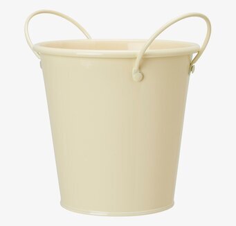 Bild av elegant gul kruka med handtag och mjukt skimmer