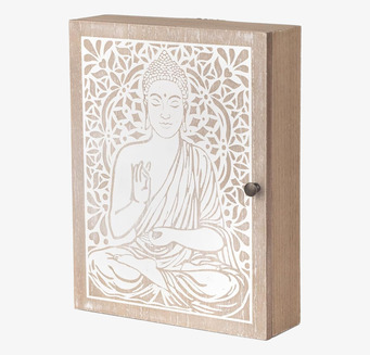 Bild av nyckelskåp med Buddha och blommor i ljust trä