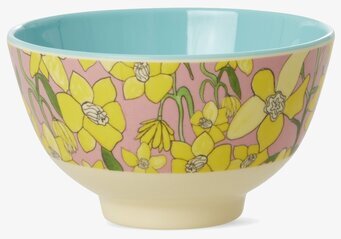 Bild av färgglad skål med påskliljor och turkos insida