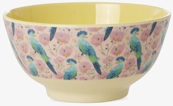 Bild av skål med exotiska fåglar, rosa blommor och gul insida