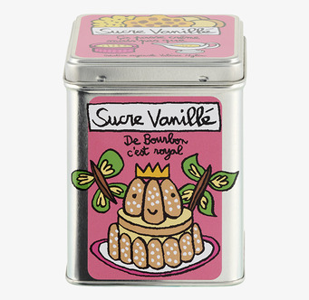 Bild på färgglad plåtburk med lekfullt bakelsemotiv i köket