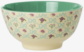 Bild på dekorativ skål med blommigt mönster och grön insida