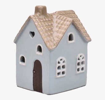 Bild av dekorativt miniatyrhus som ljuslykta i blått och beige