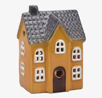 Bild av dekorativ ljuslykta i form av gyllengult keramikhus