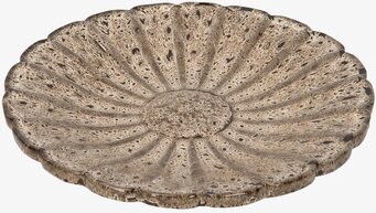 Bild av runt fågelbad i naturtoner med radiellt mönster