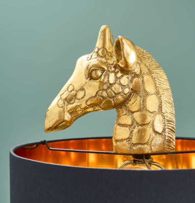 Bild av dekorativ bordslampa med guldfärgat giraffhuvud