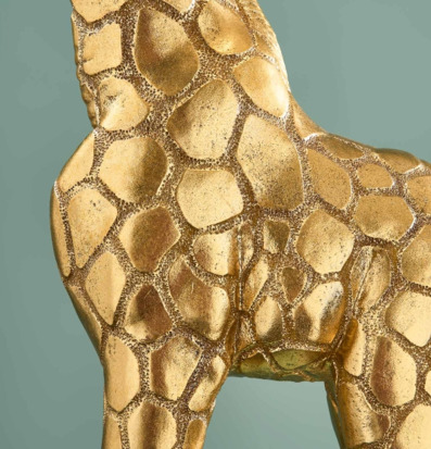 Bild på gyllene giraffmönster med skimrande metallisk yta