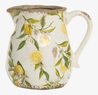 Bild av kanna med citronmönster och lantlig känsla i keramik