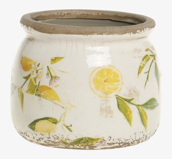 Bild på rustik cremevit kruka med citronmotiv och patinering
