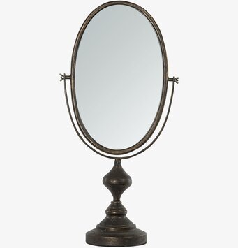 Bild på oval bordsspegel i svart metall med antik finish