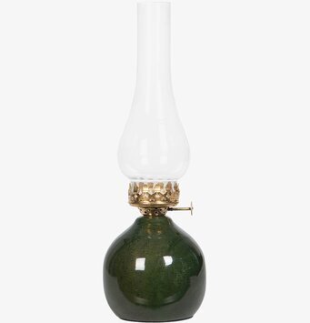 Bild av tidlös lampa i grönt glas och mässingsfärgad metall