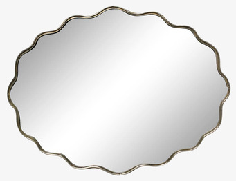 Bild av oval spegel med vågig ram i antik mässing mot vit bakgrund