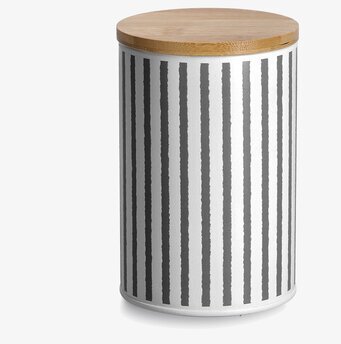 Bild av cylindrisk förvaringsburk med trälock och ränder