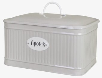 Bild på beige plåtburk med handtag och texten Apotek