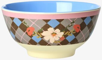 Bild på färgstark skål med geometriskt och blommigt mönster