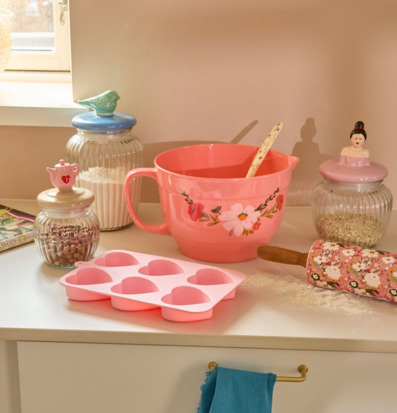 Bild av hemtrevlig bakhörna med pastell och blommönster