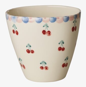 Bild på oval keramikmugg med körsbär och färgglad bård