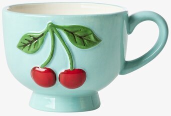 Bild på keramikkopp med körsbärsmotiv i mintgrön färg