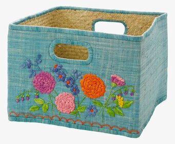 Bild av färgglad förvaringskorg med blombroderier