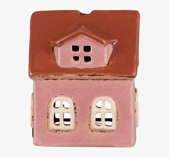 Bild av dekorativ ljuslykta i form av rosa miniatyrhus