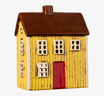 Bild av dekorativ gul ljuslykta i keramik formad som hus