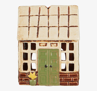 Bild av dekorativ ljuslykta formad som hus i keramik